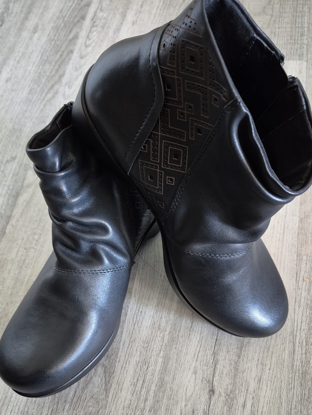 Abeo Black Ankle Booties with Subtle Geometric Detail